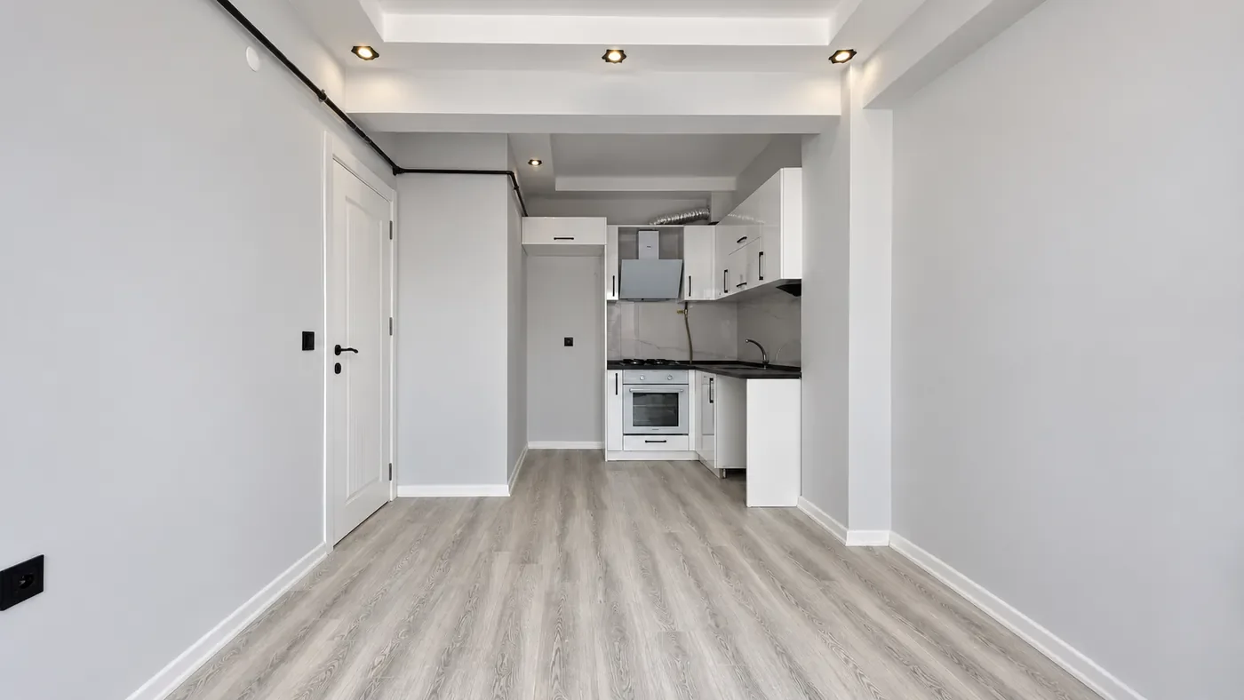 Sütlüce satılık 1+1 dairenin salon ve açık mutfak bölümü